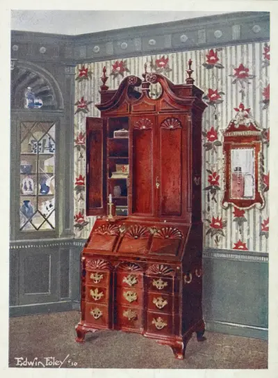 Mahogany cabinet-topped block-front scrutoir, Mahogany and gilt constitution mirror av Edwin Foley