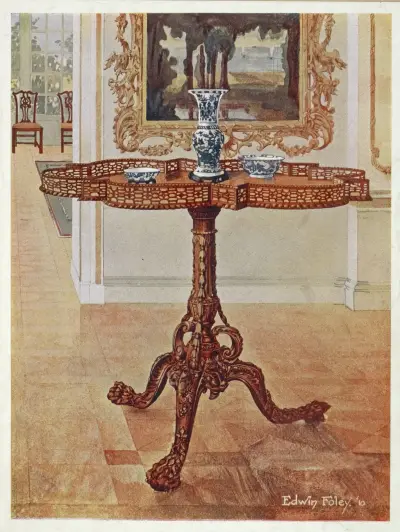 Shaped fret-rimmed gallery table av Edwin Foley