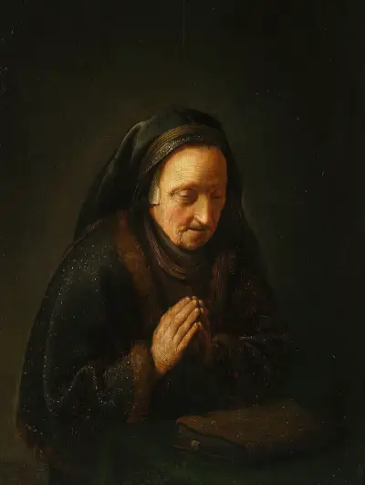 Praying old woman av Gerrit Dou