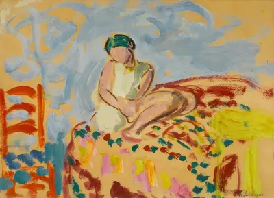 Ung flicka med grön turban sittande på en soffa av Henri Lebasque