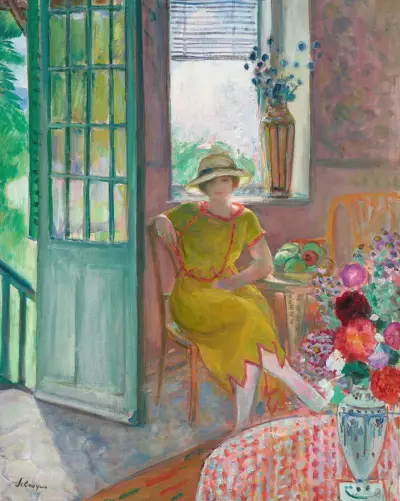 Ung kvinna i blommigt interiör av Henri Lebasque