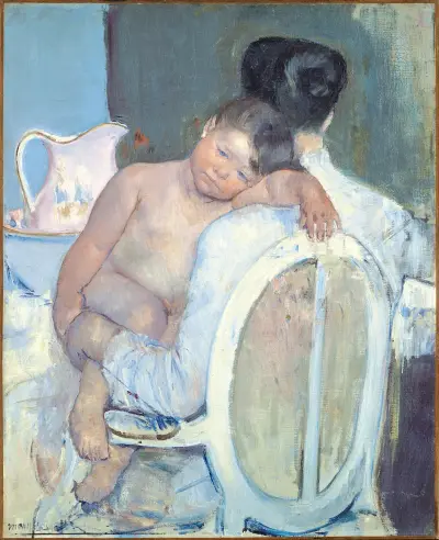 Woman Sitting with a Child in Her Arms av Mary Cassatt