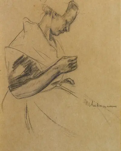 Kvinna som syr av Max Liebermann