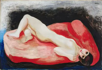 Akt liegend auf einem roten Sofa von Moïse Kisling