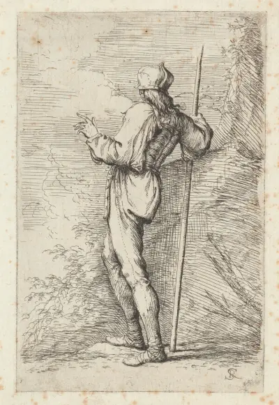 Stehender Soldat mit langem Stock vor einer Felswand von Salvator Rosa