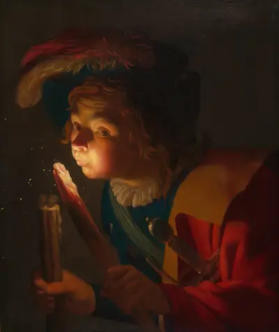 En pojke blåser på en fackla av Gerard van Honthorst