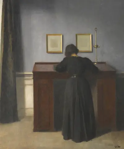 Ida Standing At A Desk av Vilhelm Hammershøi