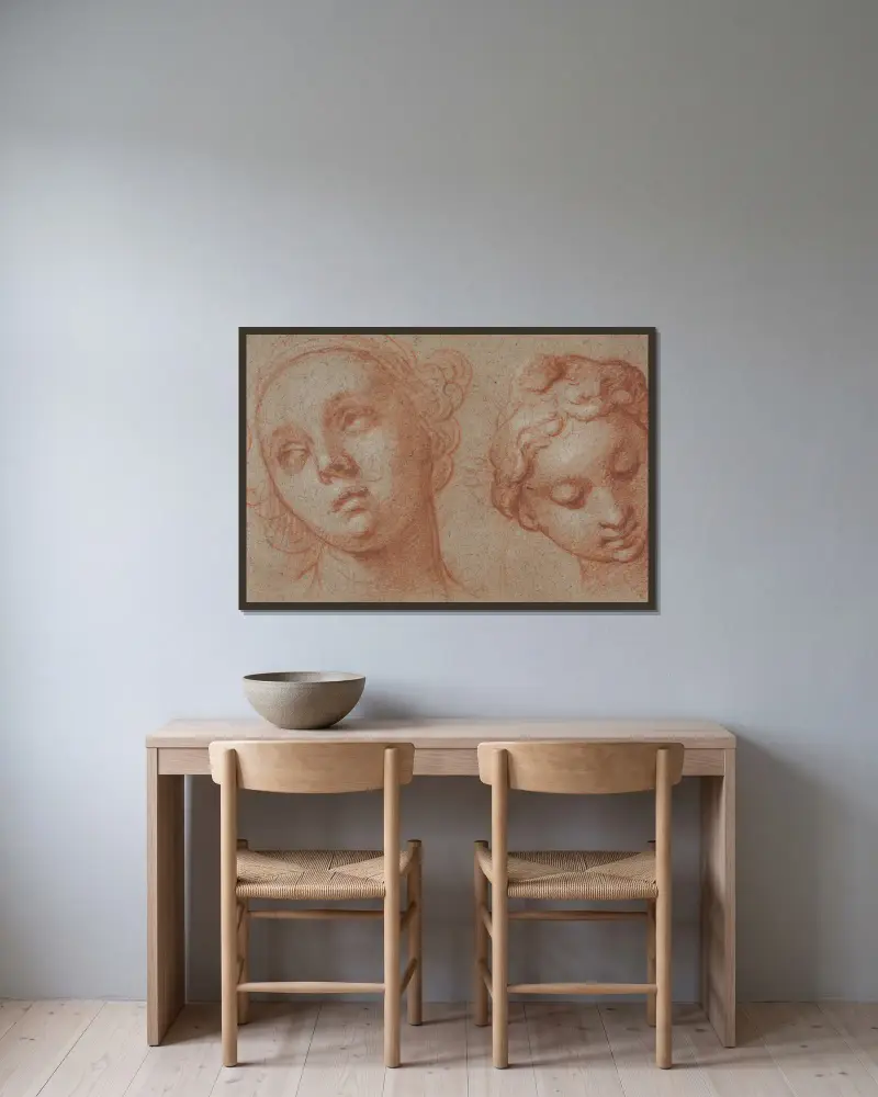 Zwei Frauenköpfe von Abraham Bloemaert gerahmt an einer Wand
