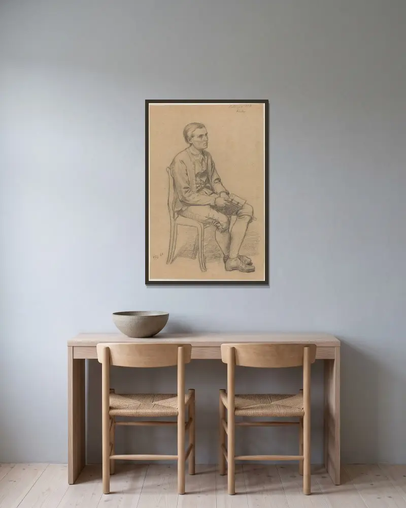 Sittande man med bok av Adolph Tidemand inramad på en vägg