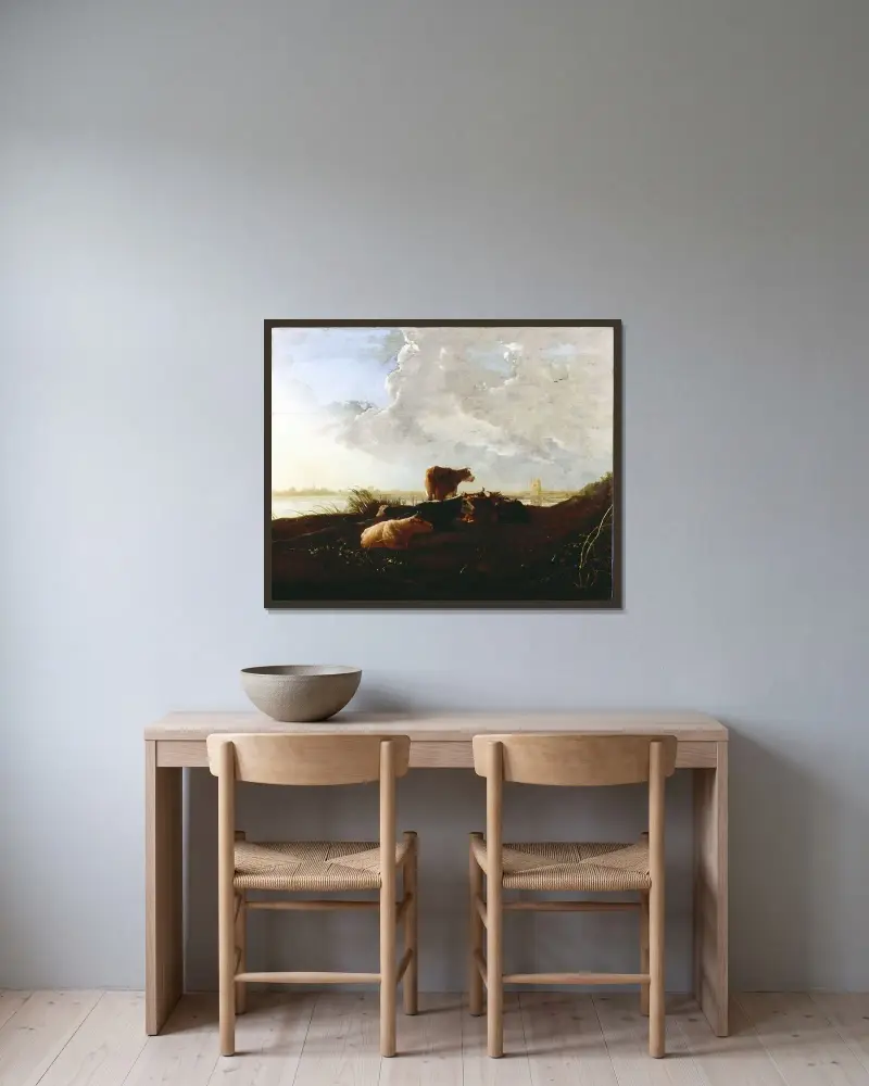 Kor nära en flod av Aelbert Cuyp inramad på en vägg