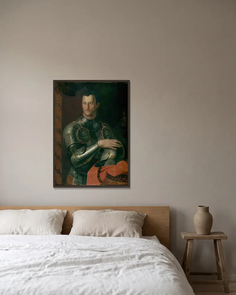 Cosimo I De’ Medici av Agnolo Bronzino inramad på en vägg