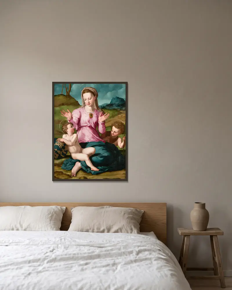 Madonna and Child with Saint John the Baptist av Agnolo Bronzino inramad på en vägg