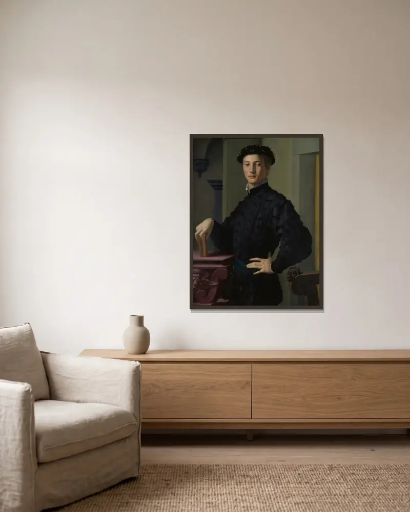 Portrait of a Young Man av Agnolo Bronzino inramad på en vägg