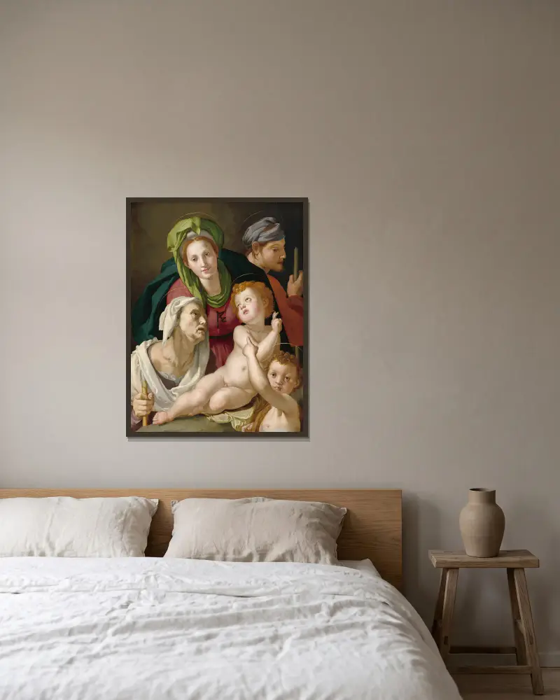 The Holy Family av Agnolo Bronzino inramad på en vägg