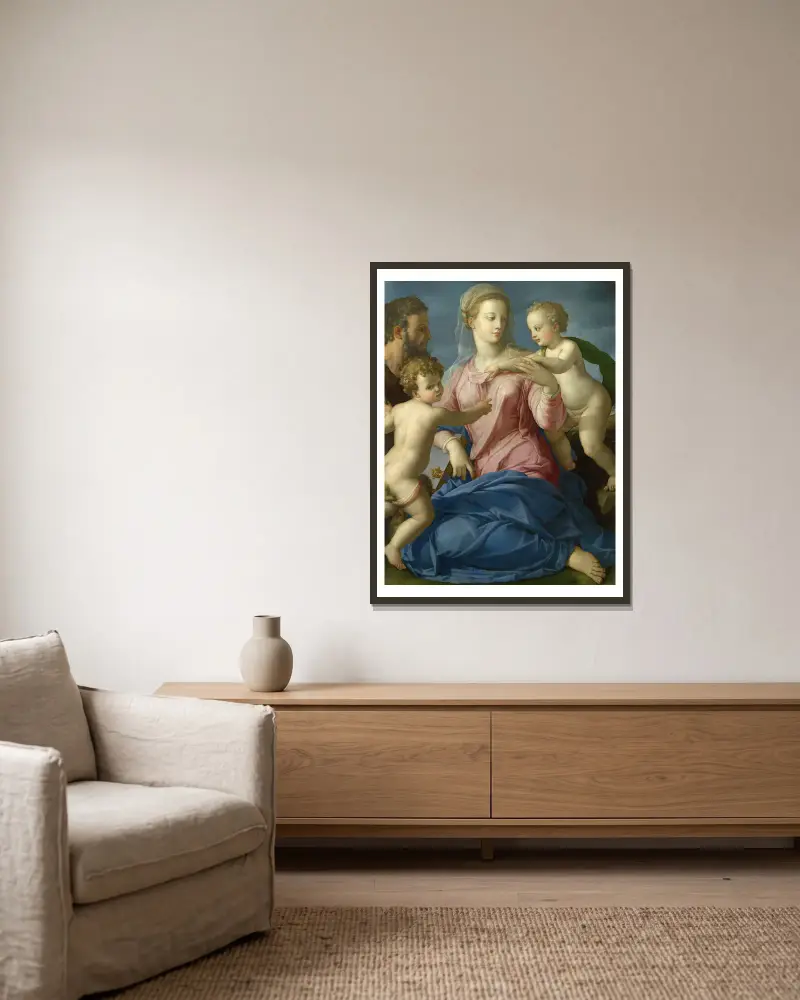 The Holy Family with the Infant Saint John the Baptist av Agnolo Bronzino inramad på en vägg