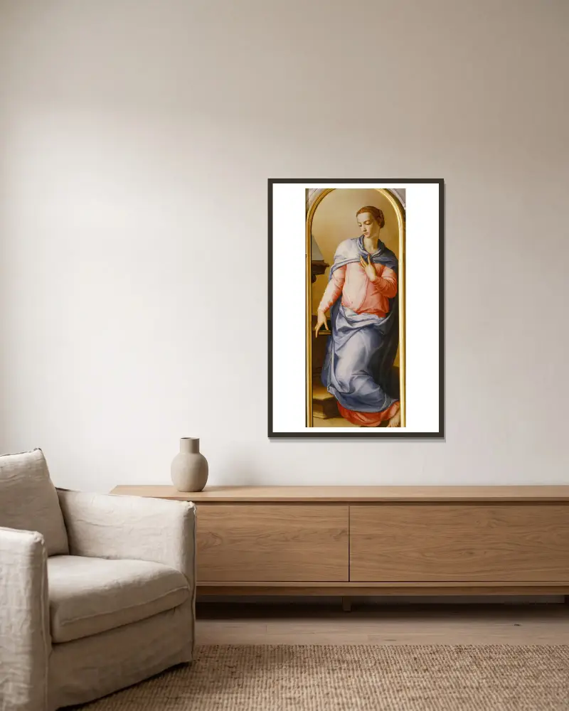 Virgin of the Annunciation av Agnolo Bronzino inramad på en vägg