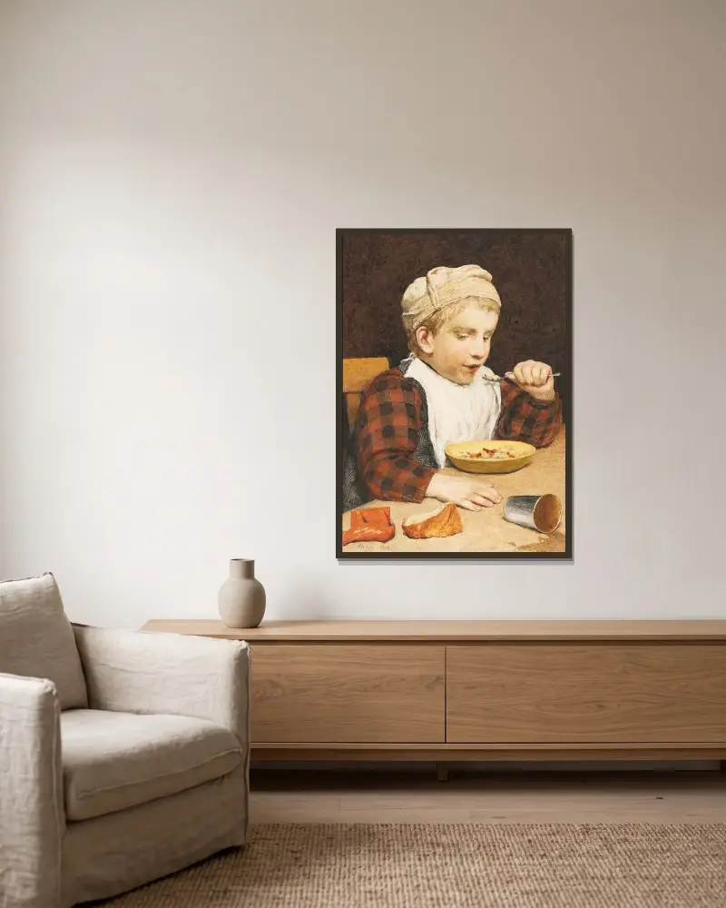 Pojke med mössa vid maten av Albert Anker inramad på en vägg