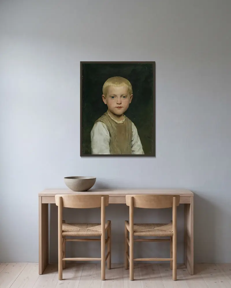 Knabenbildnis (Dr Heiri) av Albert Anker inramad på en vägg