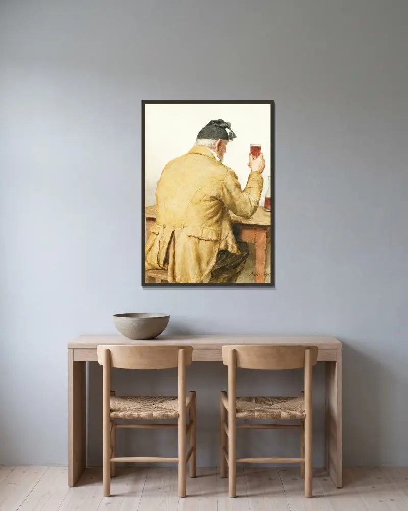Alter Mann an einem Tisch sitzend, von hinten gesehen von Albert Anker gerahmt an einer Wand