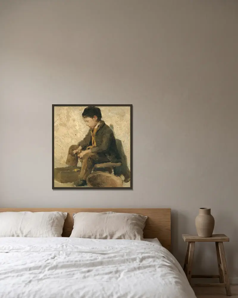 Sitzender Junge beim Gemüseschälen von Albert Anker gerahmt an einer Wand
