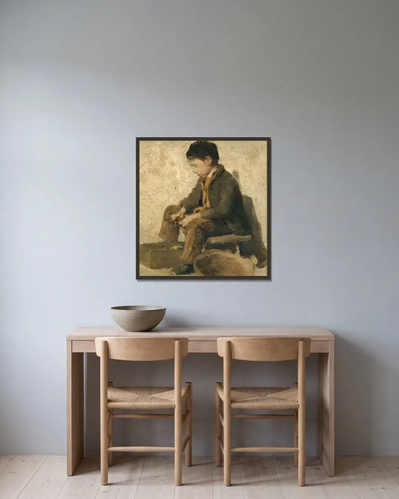 Sitzender Junge beim Gemüseschälen von Albert Anker gerahmt an einer Wand