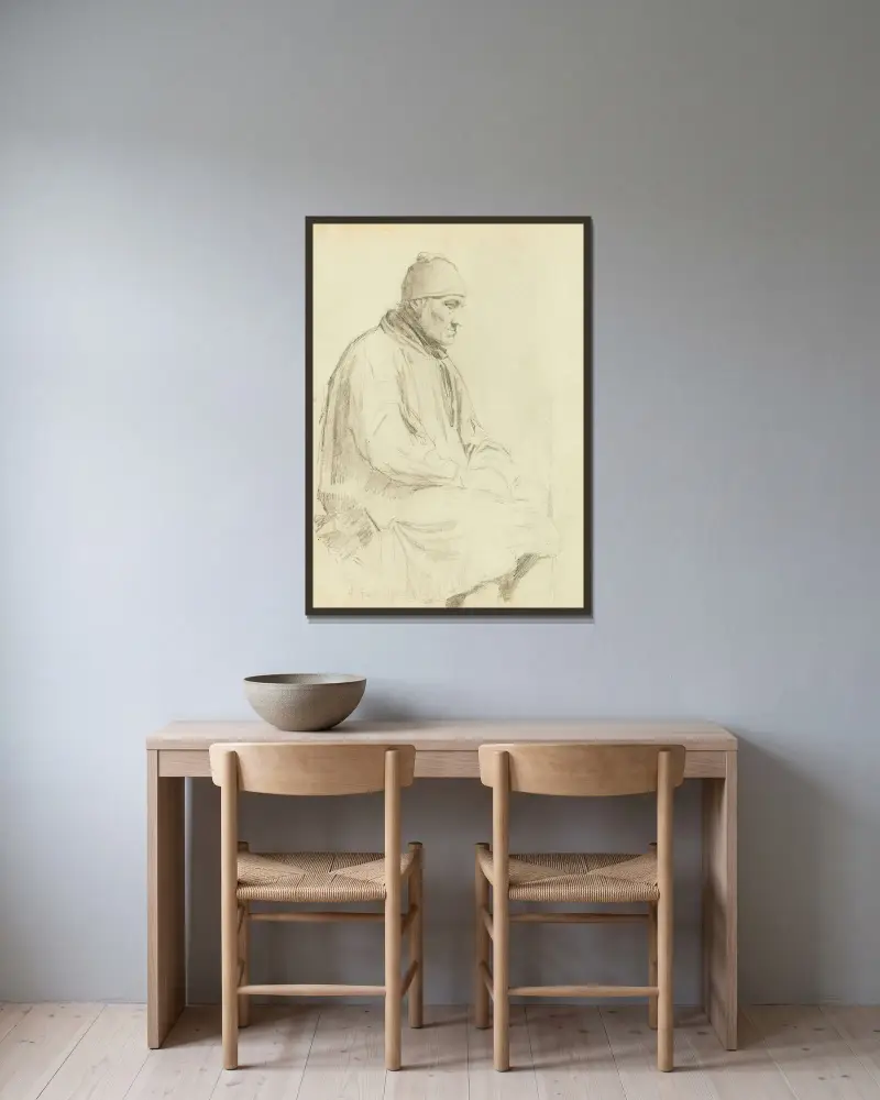 Sitzender Mann mit Mütze von Albert Anker gerahmt an einer Wand