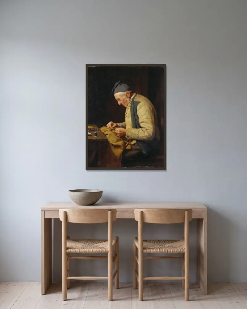 Der Dorfschneider von Albert Anker gerahmt an einer Wand