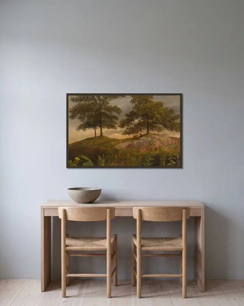 Landskap med kor av Albert Bierstadt inramad på en vägg