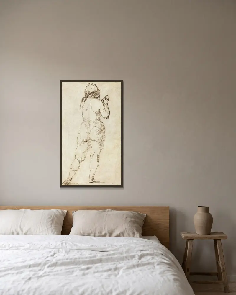 Female Nude Praying av Albrecht Dürer inramad på en vägg