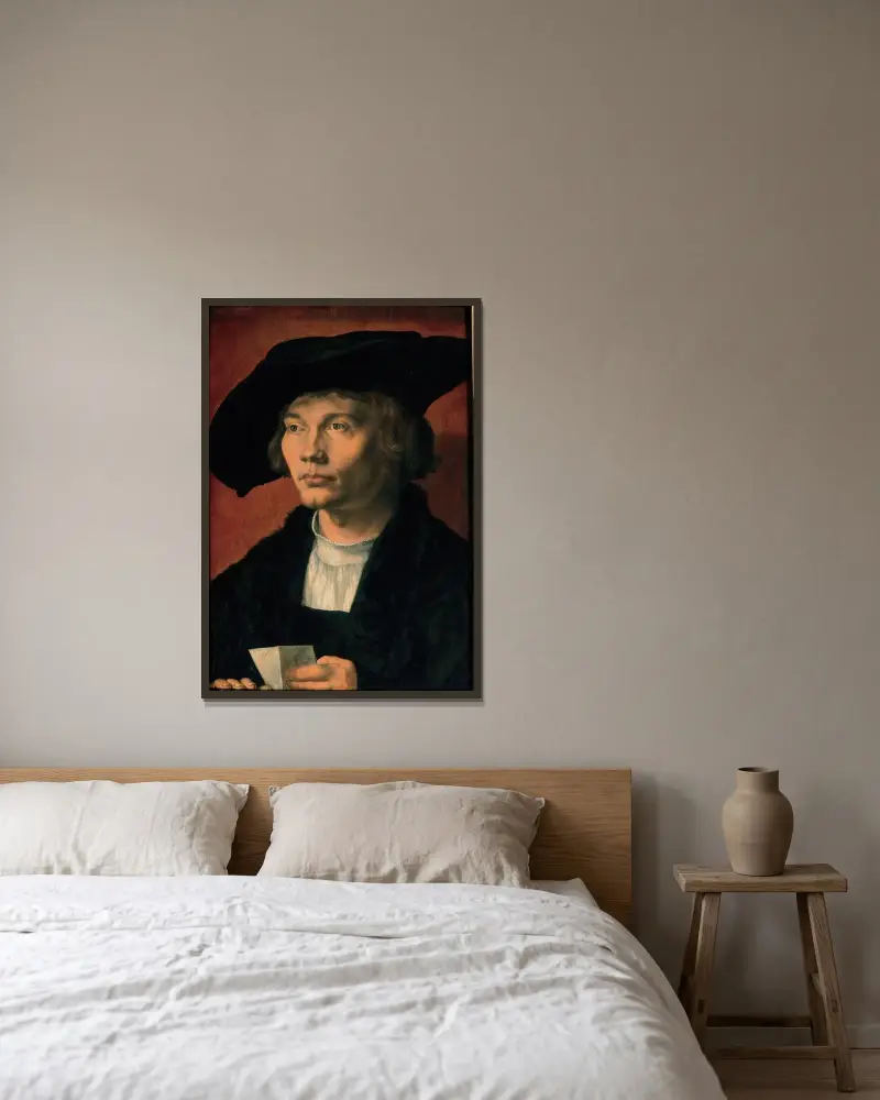 Portrait of Bernhart von Reesen av Albrecht Dürer inramad på en vägg