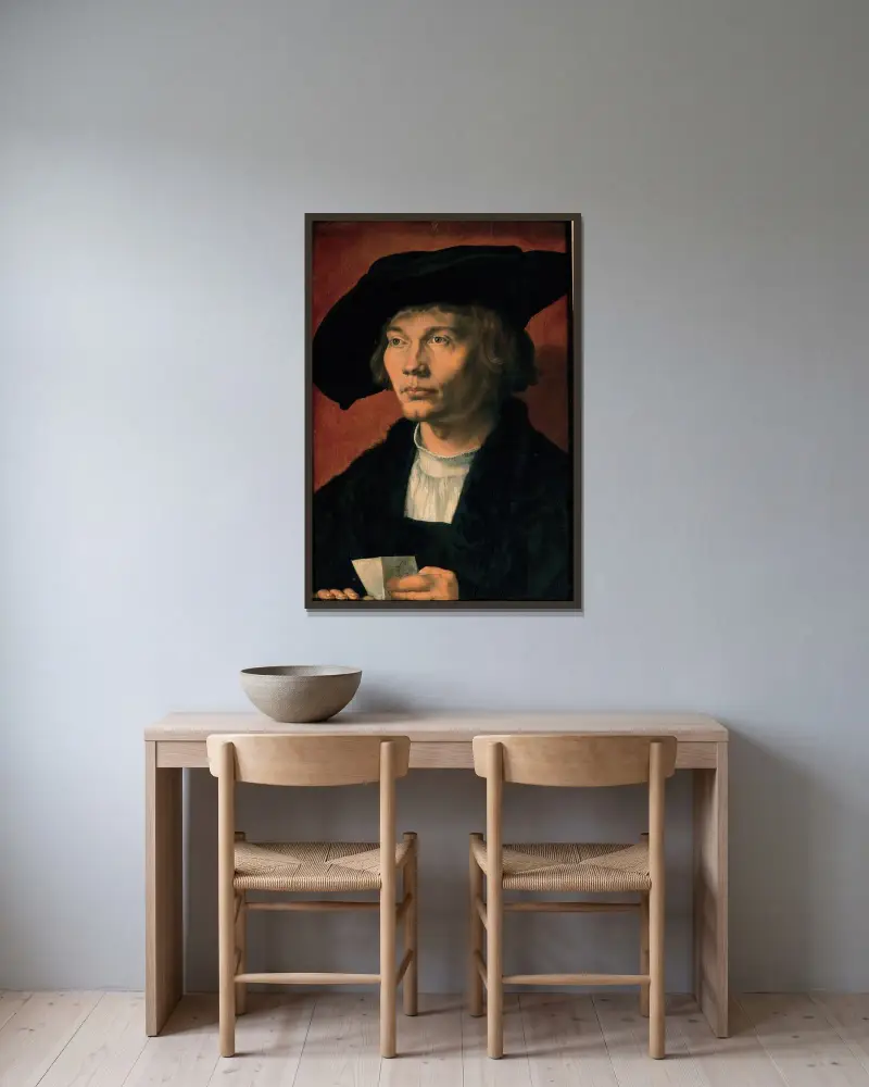 Portrait of Bernhart von Reesen av Albrecht Dürer inramad på en vägg