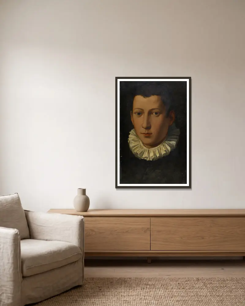 Portrait of a Young Man av Alessandro Allori inramad på en vägg