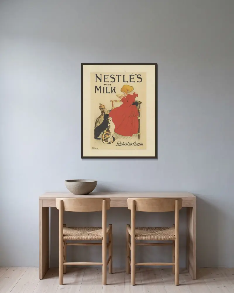 Nestlés schweiziska mjölk med mest grädde av Théophile Alexandre Steinlen inramad på en vägg