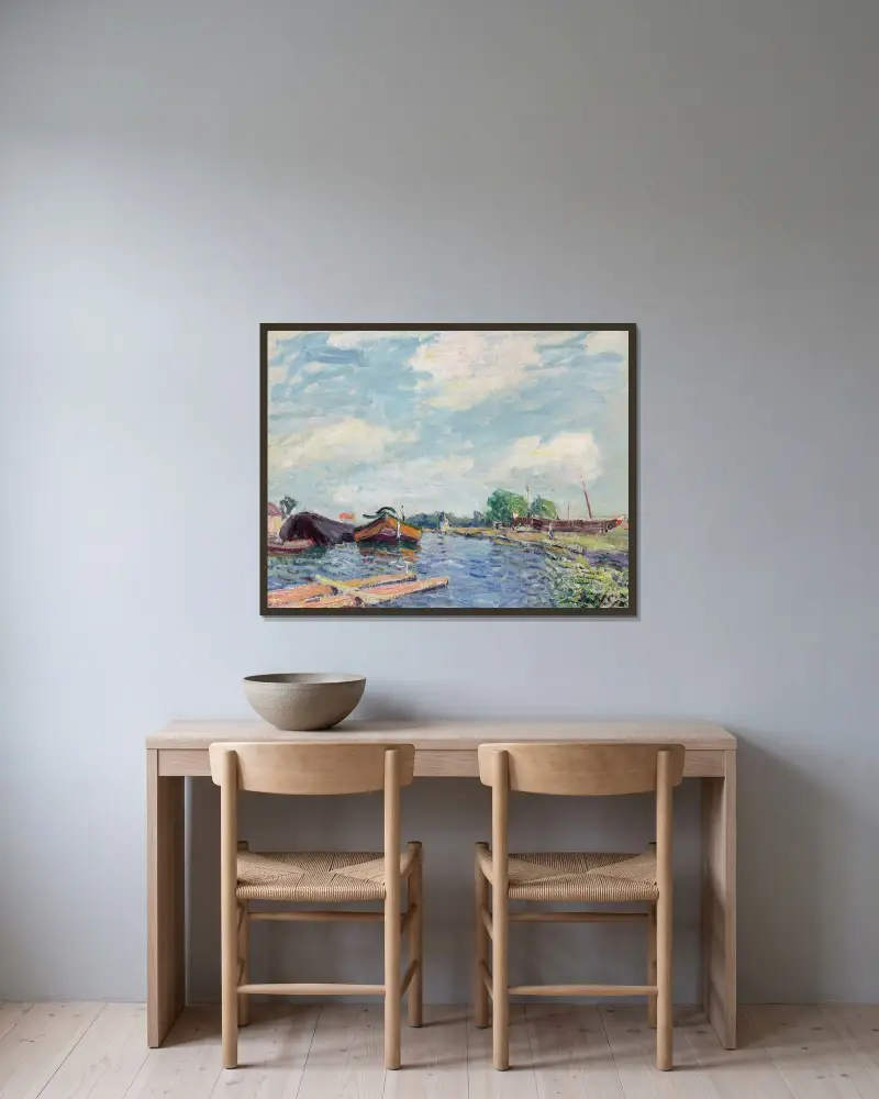 Canal du Loing à Saint-Mammès av Alfred Sisley inramad på en vägg
