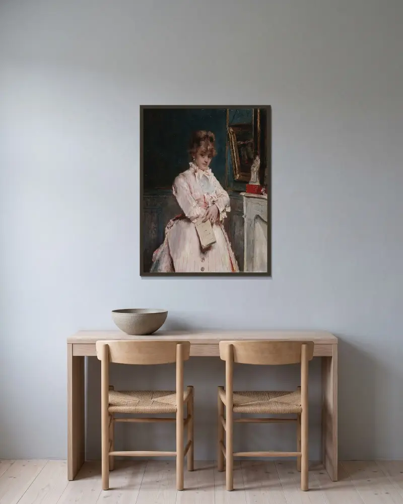 Ung kvinna med bok av Alfred Stevens inramad på en vägg