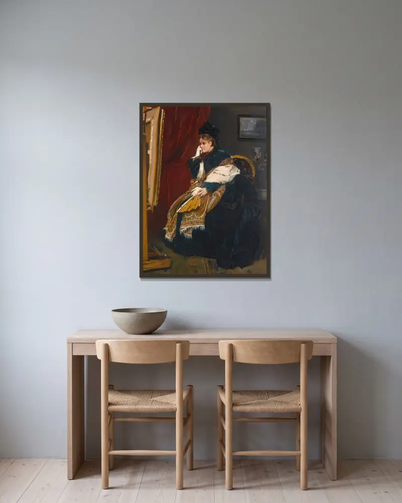 Kvinna i grönt i ateljén av Alfred Stevens inramad på en vägg