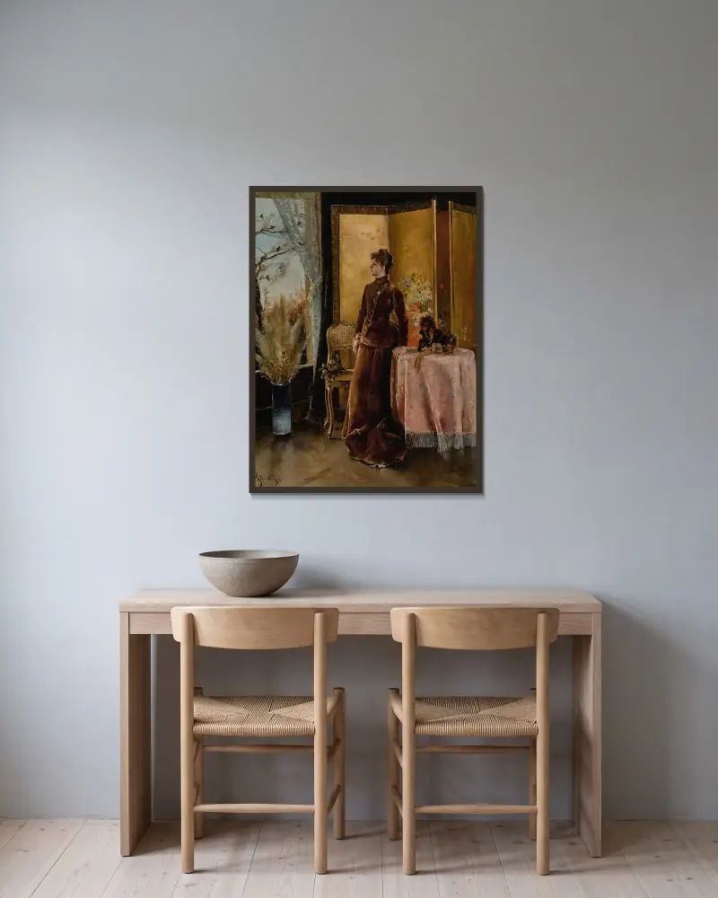 Der Schnee von Alfred Stevens gerahmt an einer Wand