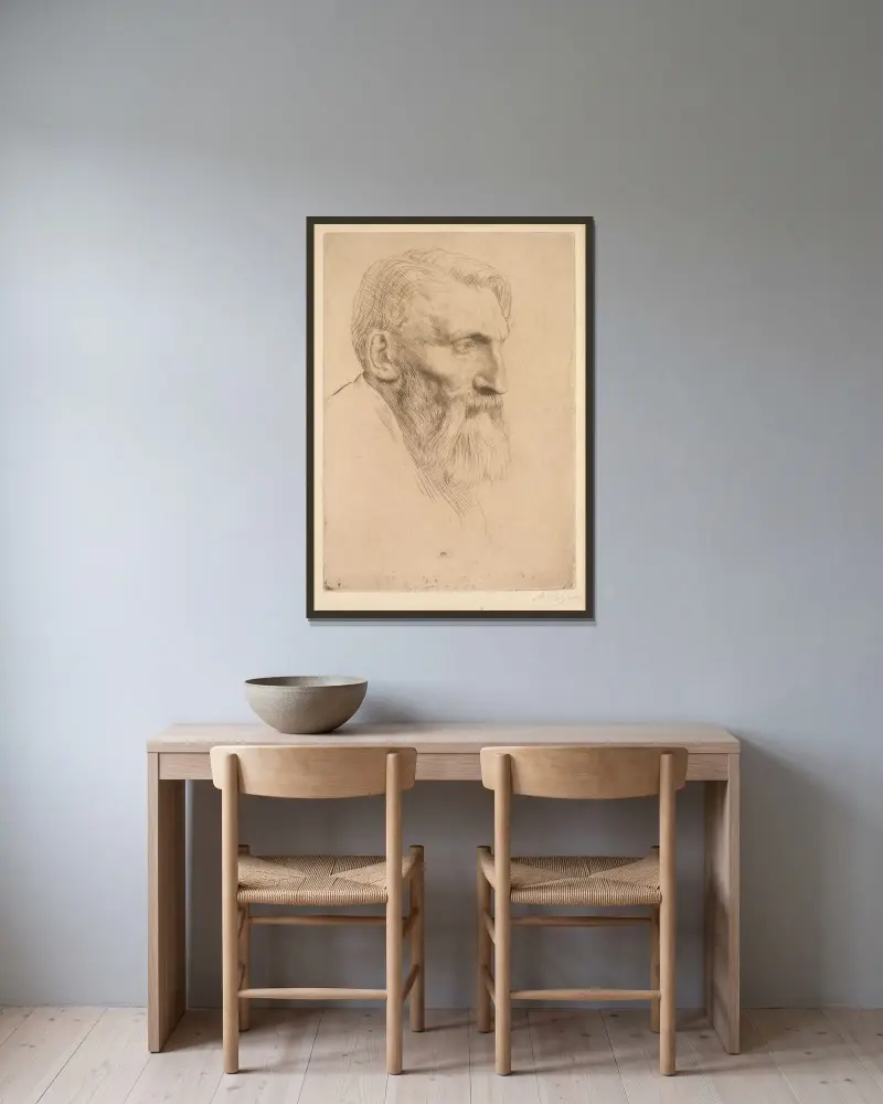 Auguste Rodin av Alphonse Legros inramad på en vägg