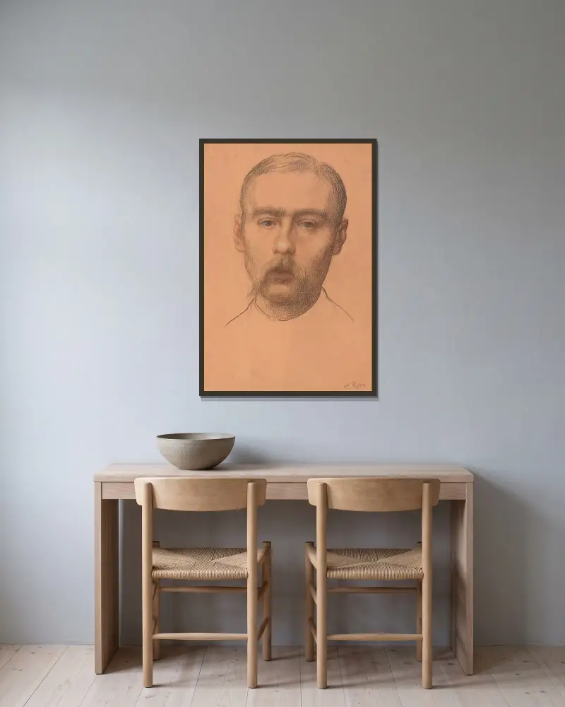 Manshuvud (möjligt porträtt av professor E.D. Adams) av Alphonse Legros inramad på en vägg