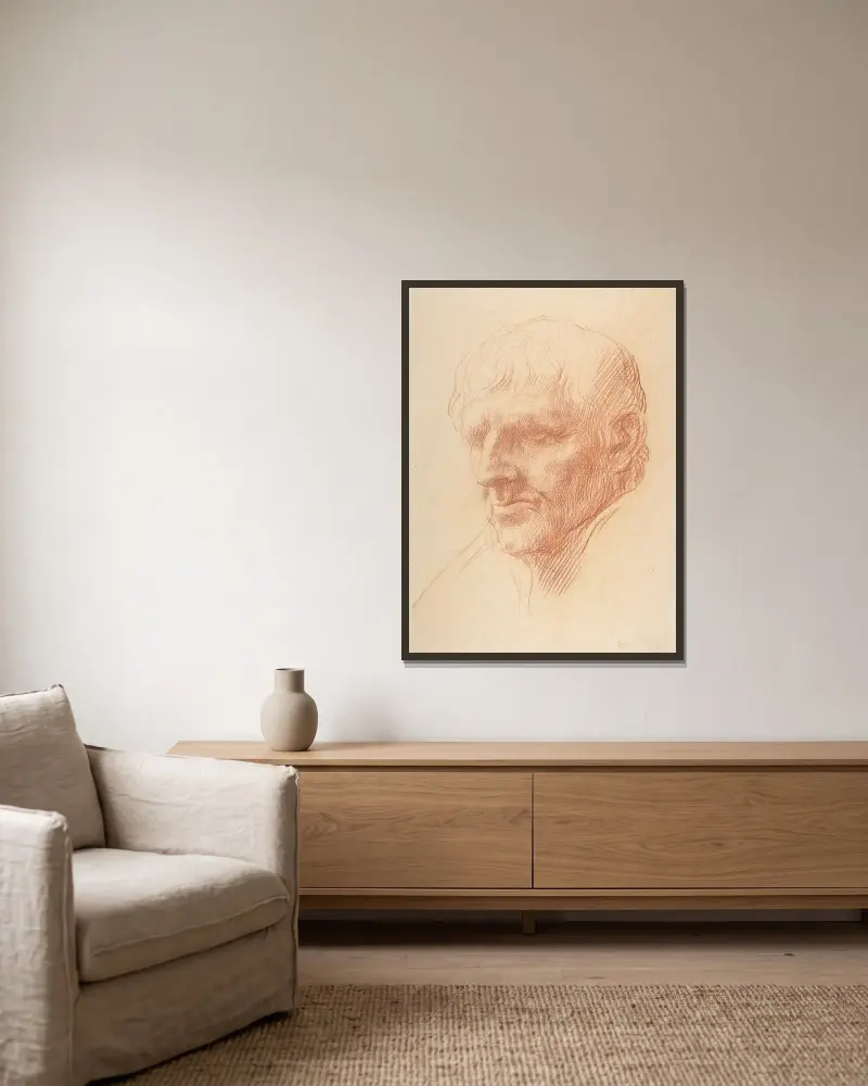 Manshuvud av Alphonse Legros inramad på en vägg