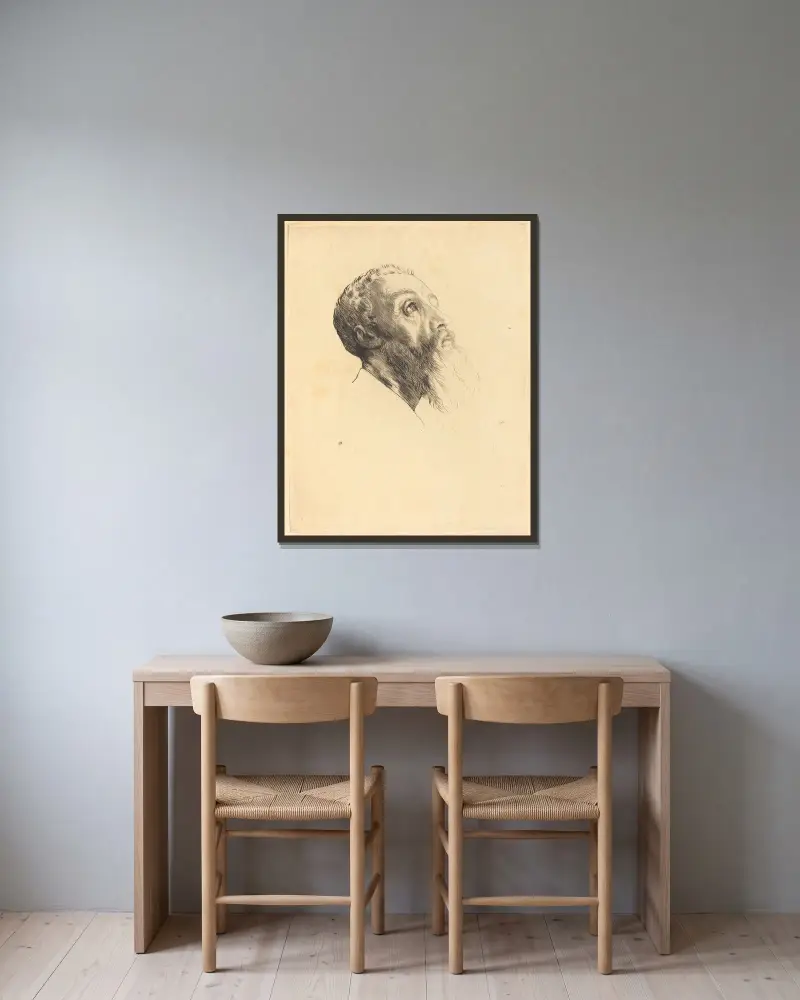 Huvud av modell av Alphonse Legros inramad på en vägg
