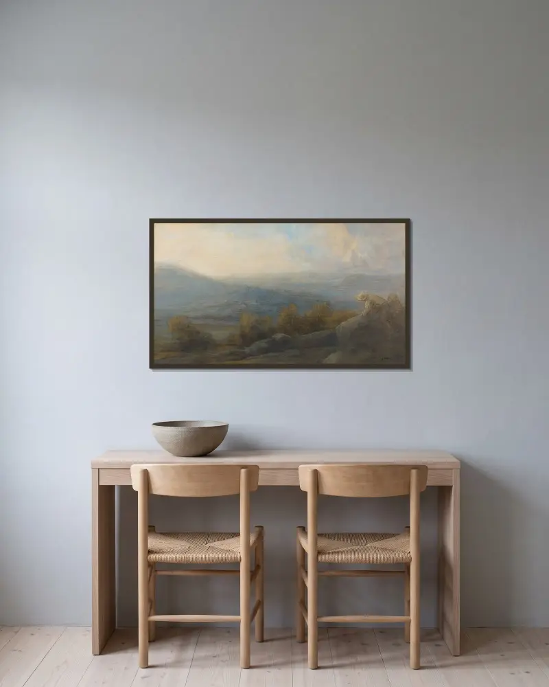 Bergslandskap med två figurer till höger av Alphonse Legros inramad på en vägg