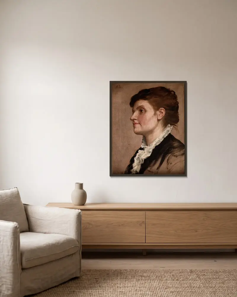 Kvinnopporträtt av Alphonse Legros inramad på en vägg