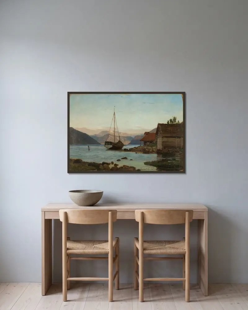 Afton vid Balestrand av Amaldus Nielsen inramad på en vägg
