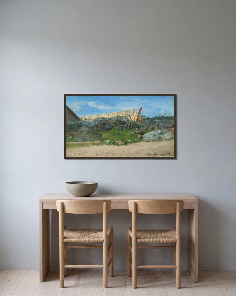 Båtbyggeri i Lillesand av Amaldus Nielsen inramad på en vägg