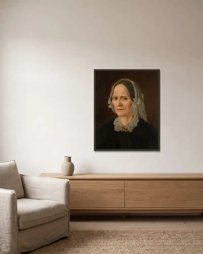 Porträtt av konstnärens mor av Amaldus Nielsen inramad på en vägg