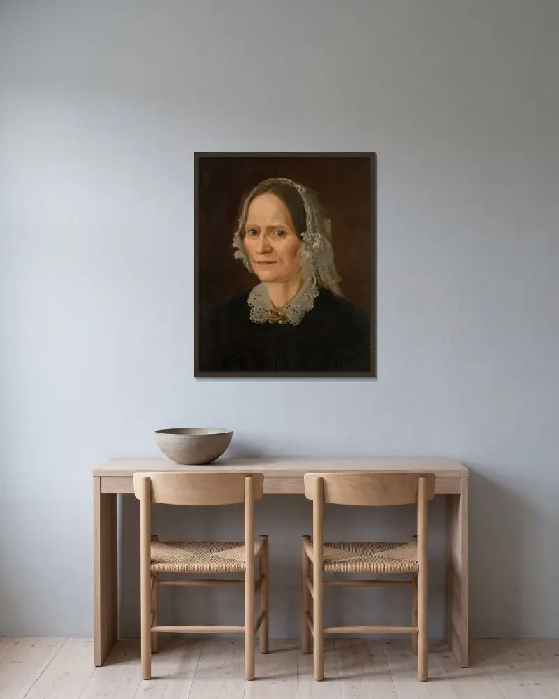 Porträtt av konstnärens mor av Amaldus Nielsen inramad på en vägg
