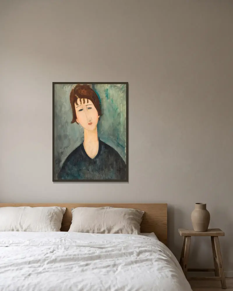 Frauenbildnis von Amedeo Modigliani gerahmt an einer Wand