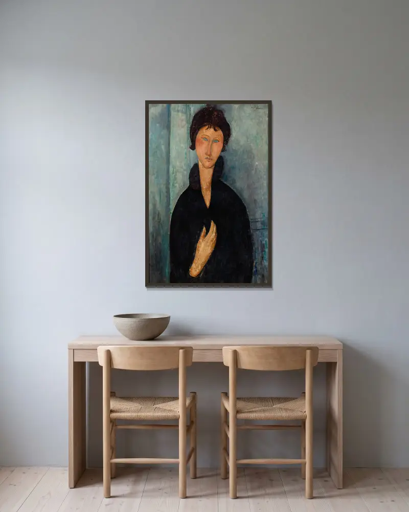 Femme aux yeux bleus av Amedeo Modigliani inramad på en vägg