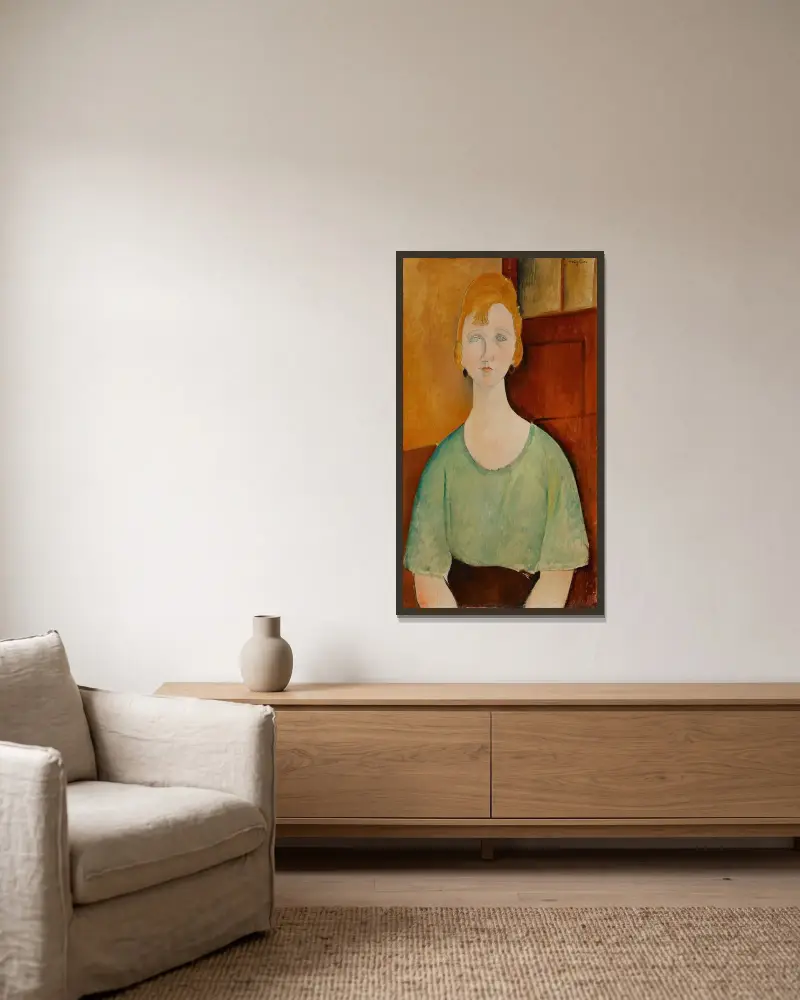 Girl in a Green Blouse av Amedeo Modigliani inramad på en vägg